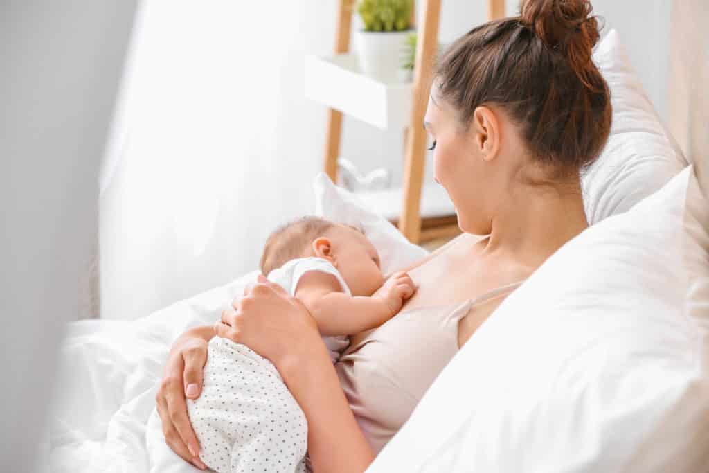 A mom breastfeeding a baby